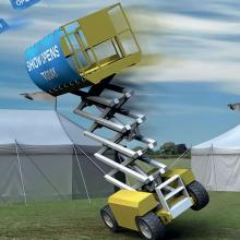 Scissor lift MEWP with banner overturning